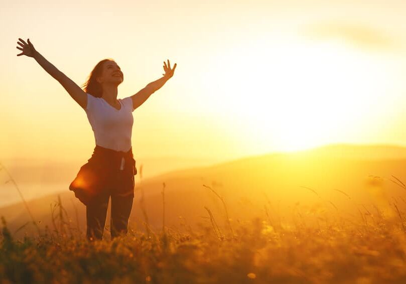 Happy,Woman,On,The,Sunset,In,Nature,In,Summer,With