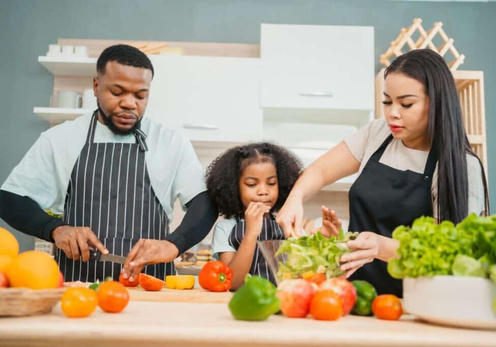Kind,African,American,Parents,Teaching,Their,Adorable,Daughter,How,To